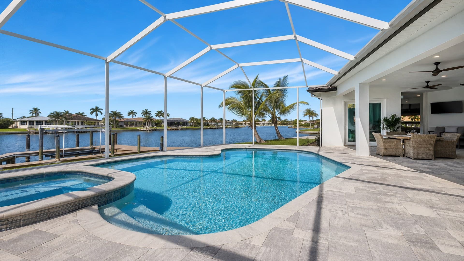 Southwest Florida home with pool and lanai facing the water