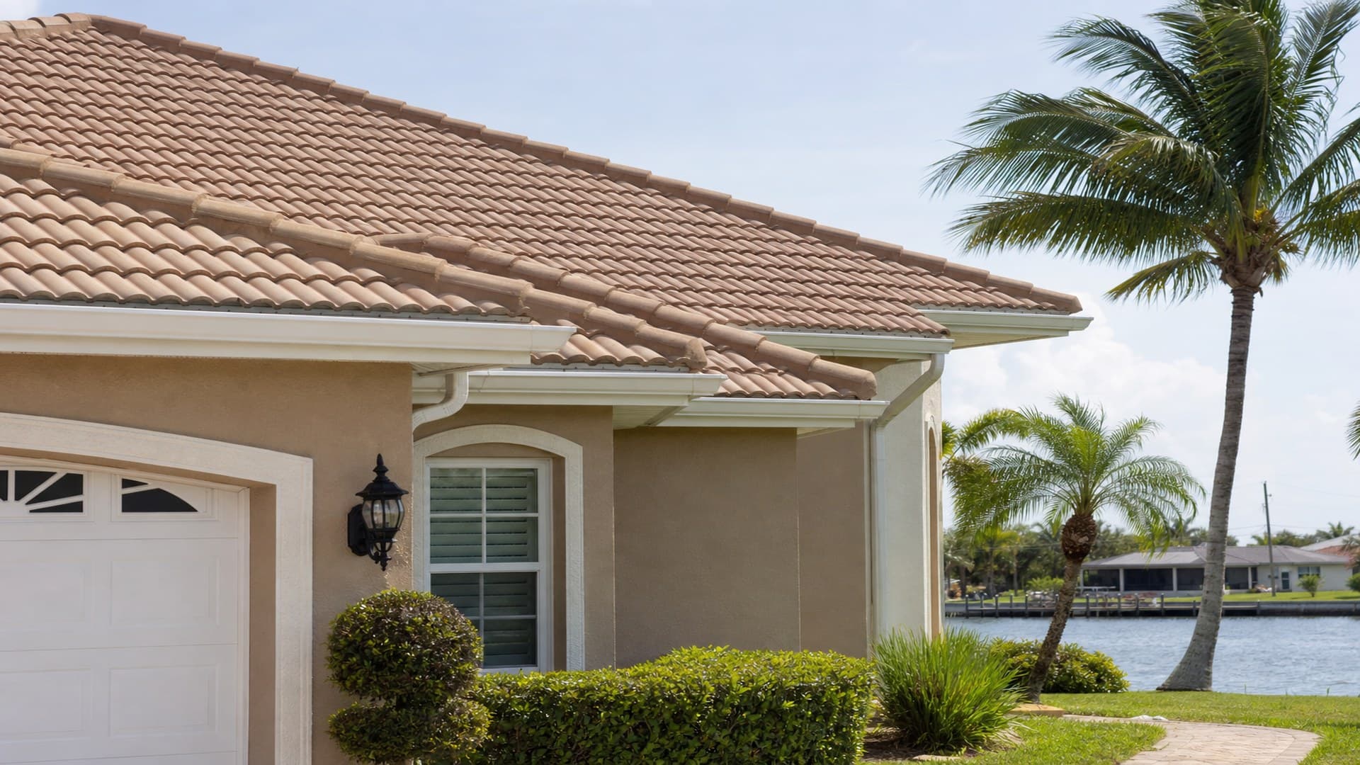 Waterfront home exterior and tile roof